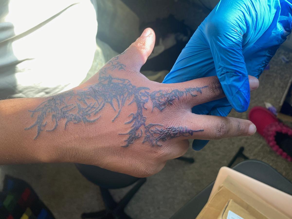 Hand tree tattoo
